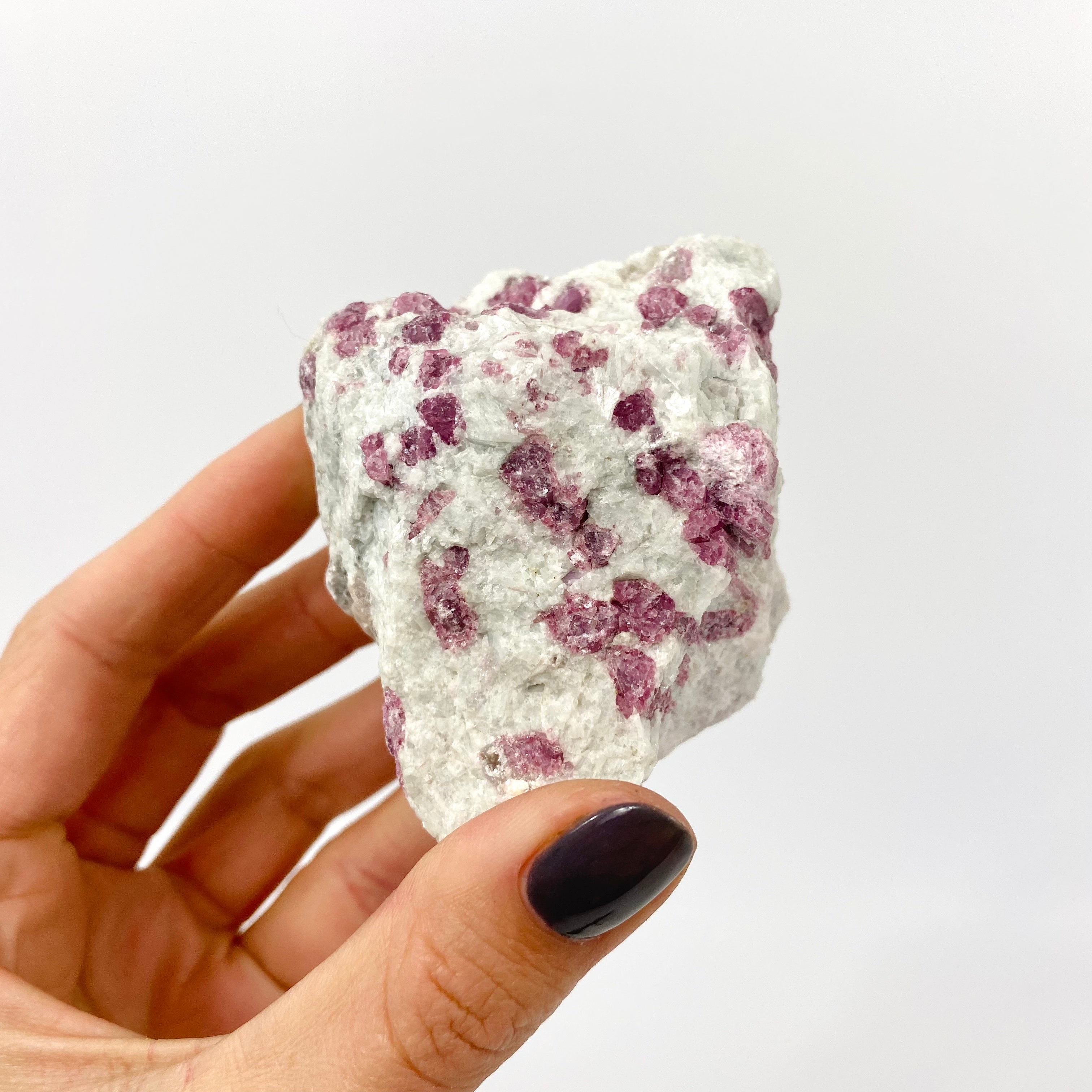 Crystals NZ: pink tourmaline in quartz crystal