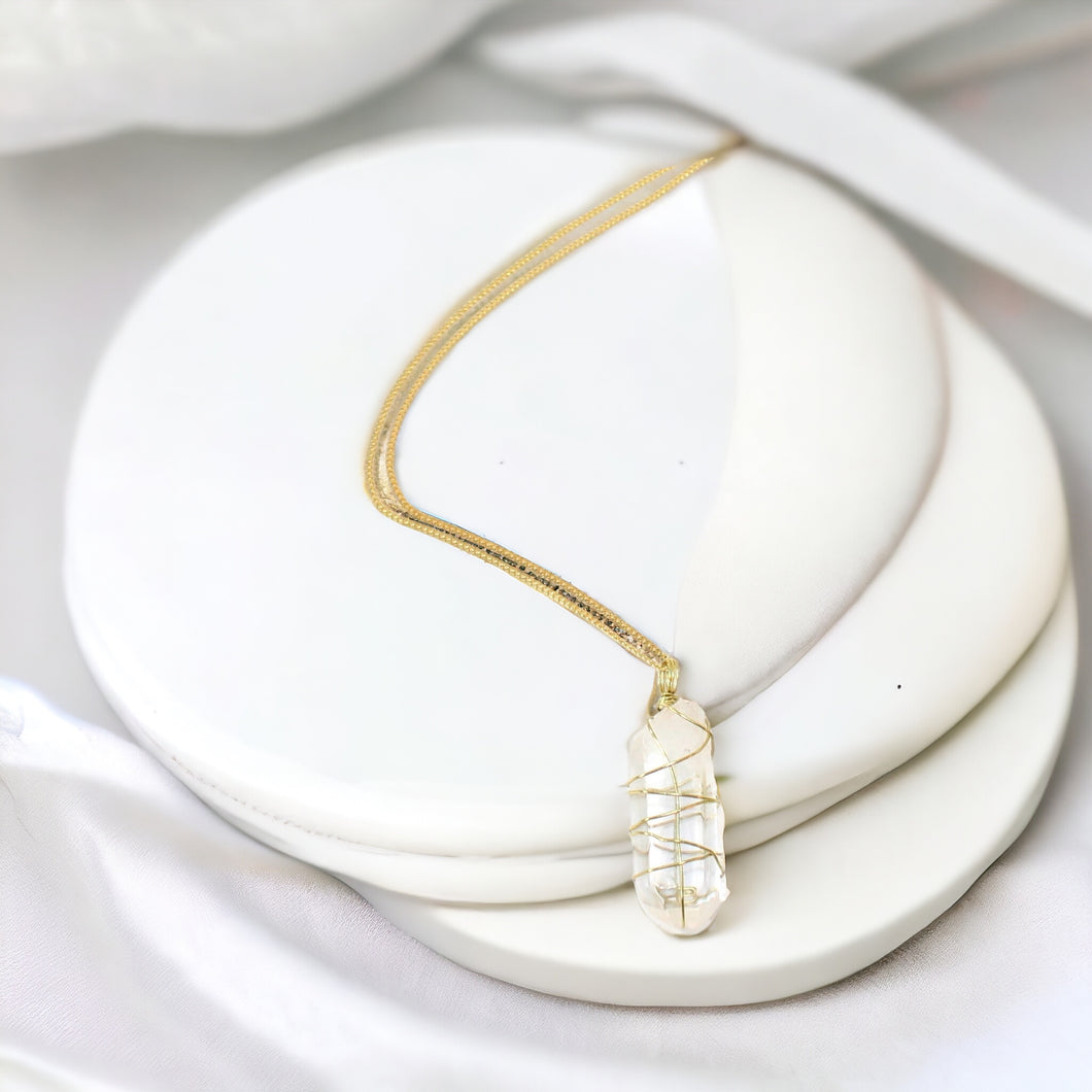 Bespoke NZ-made clear quartz crystal pendant with 18