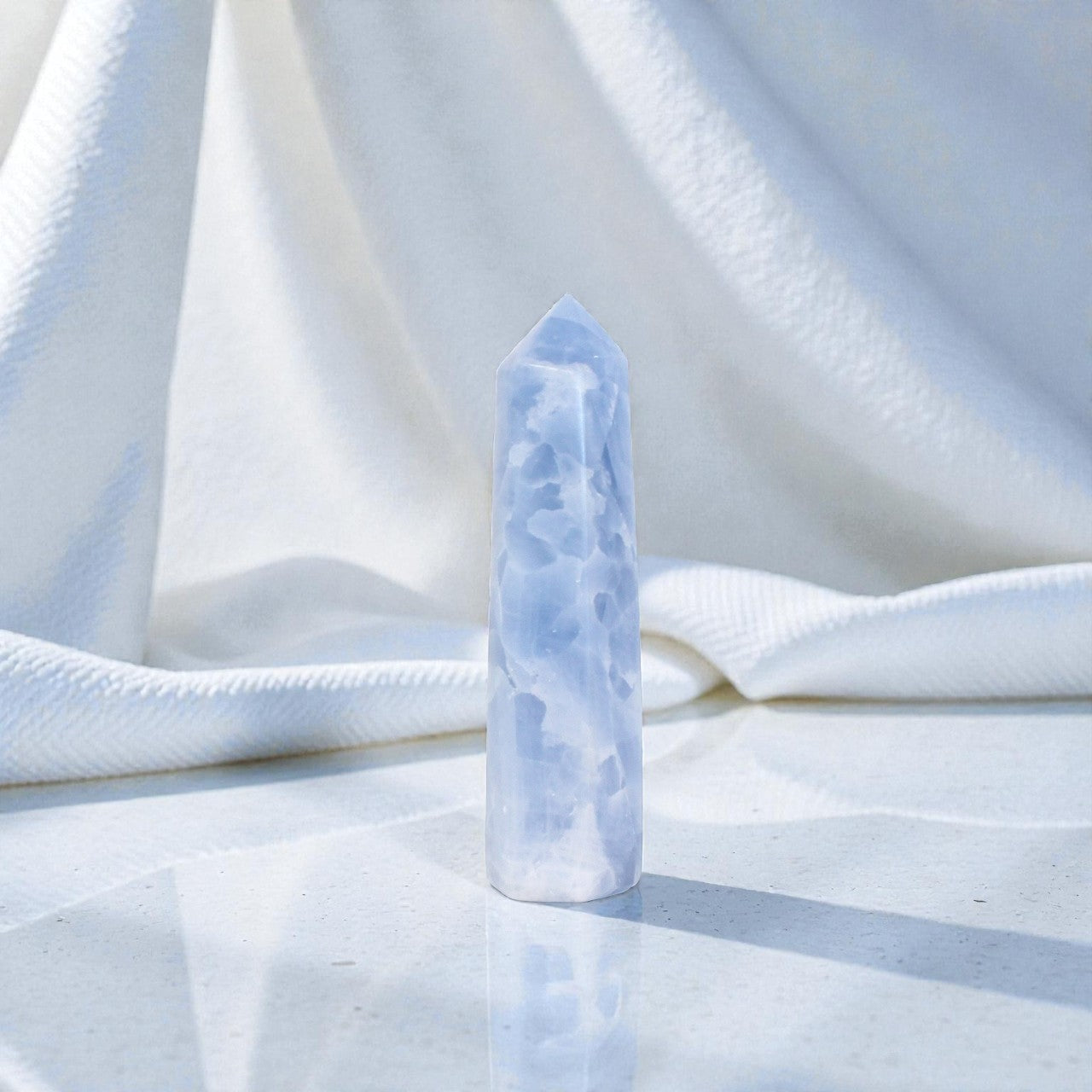 Blue Calcite Tower | ASH & STONE Premium online crystals. Free express shipping. 
