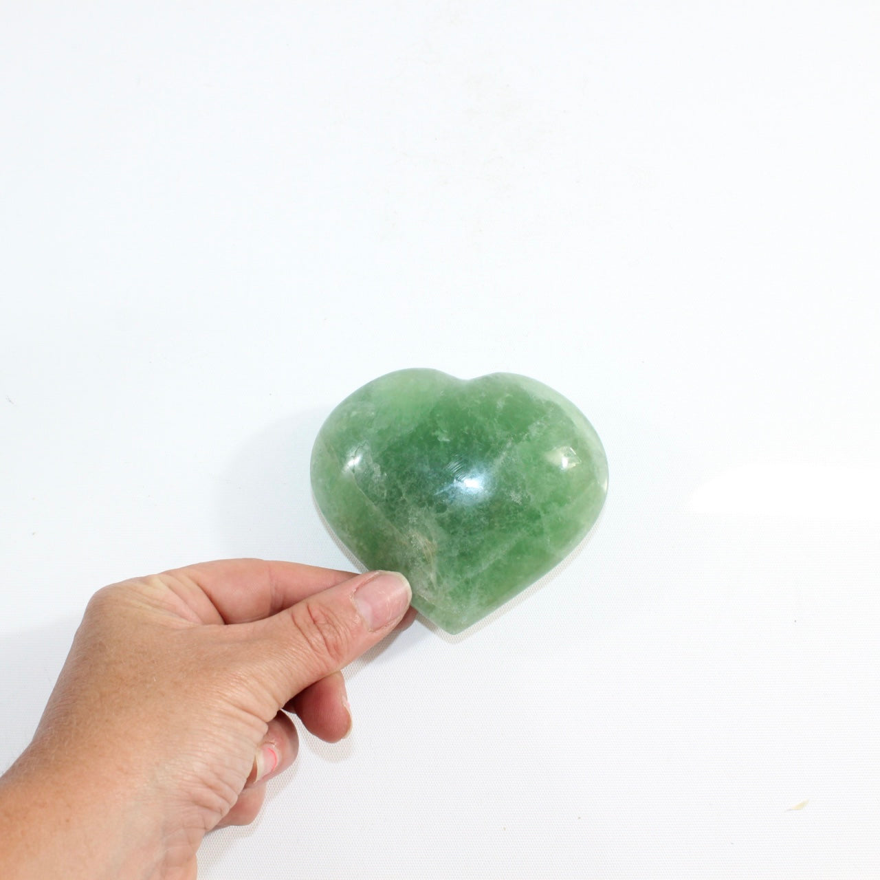 Green Fluorite crystal heart | ASH & STONE. Premium online crystals. Free express shipping NZ