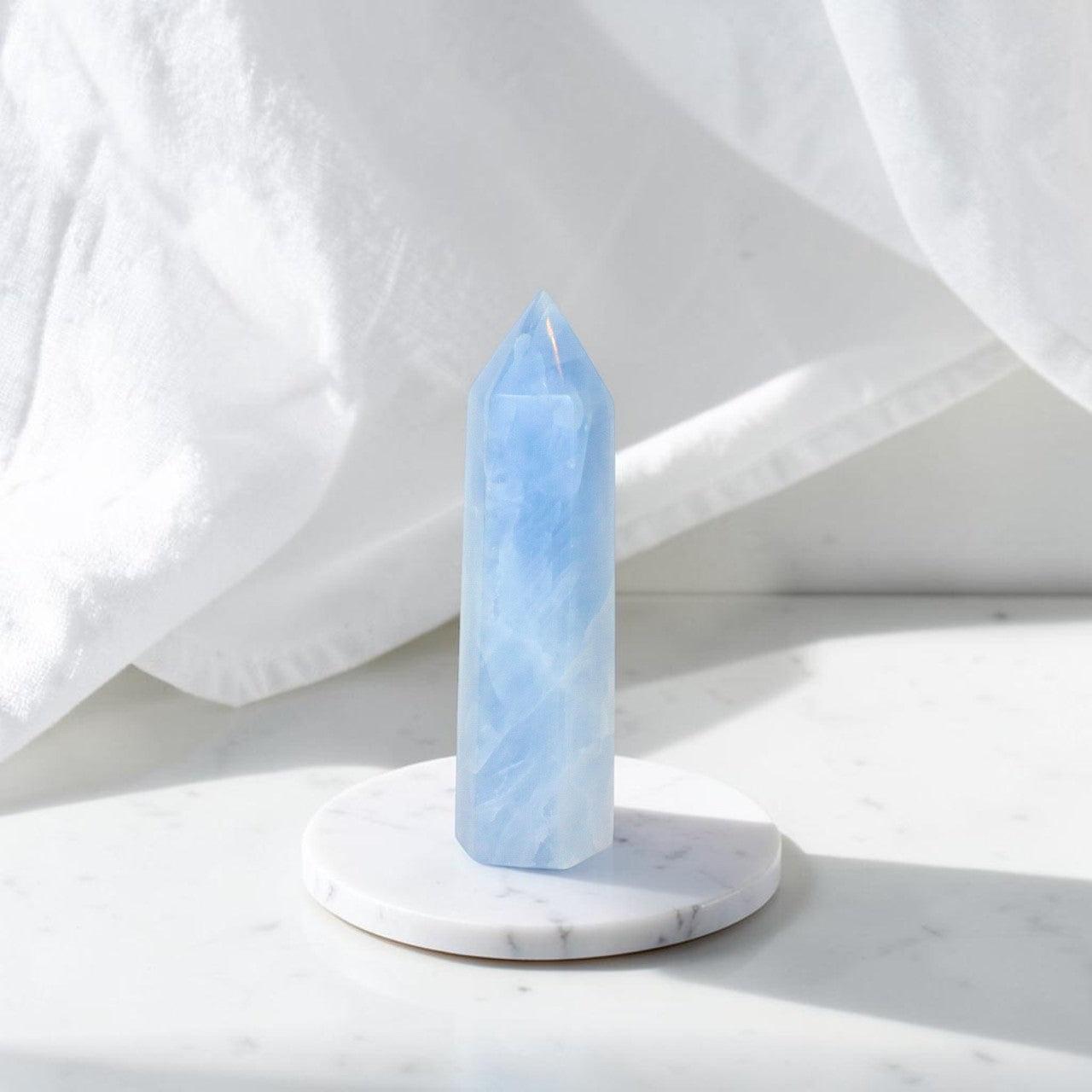 Blue Calcite Tower  | ASH & STONE. Premium online crystals. Free shipping