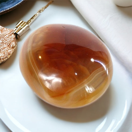 Carnelian polished crystal palm stone | ASH&STONE Crystals Shop Auckland NZ