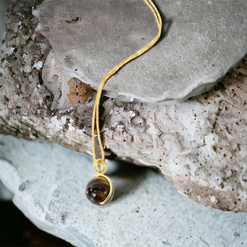 NZ-made tigers eye crystal pendant with 16