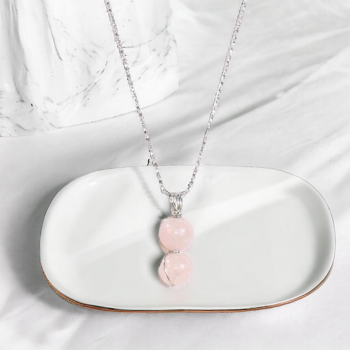 NZ-made rose quartz crystal pendant with 18