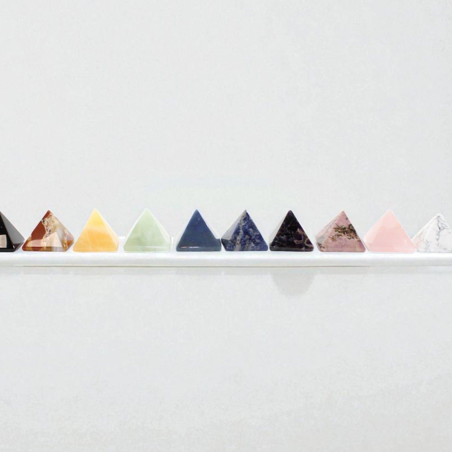 Full Chakra Crystal Pyramid Set.  Free express shipping. Shop online from ASH&STONE crystal shop Auckland NZ. AfterPay available.