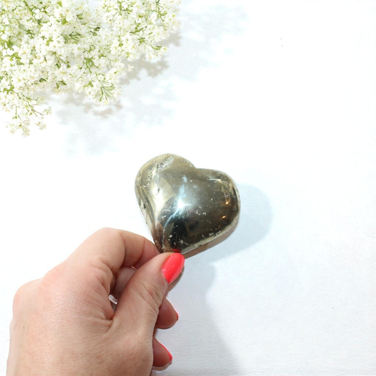 Pyrite Polished Heart. Attract success. Free express shipping. Buy Pyrite crystals online from ASH&STONE Auckland crystal shop. AfterPay available.