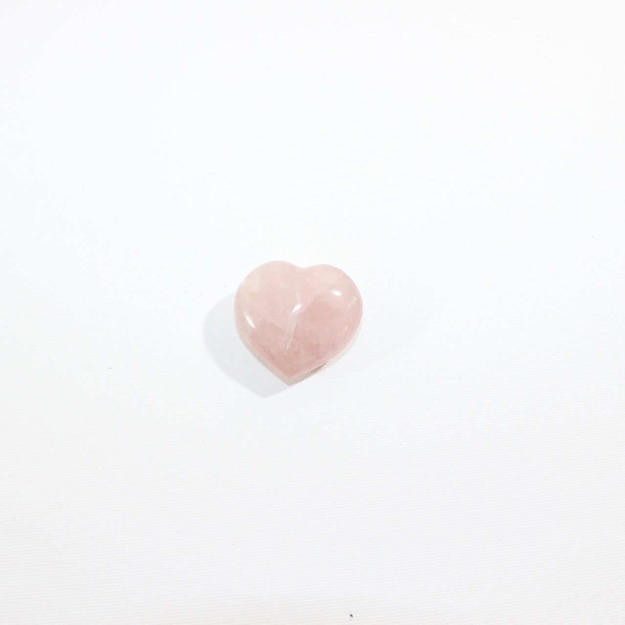 Small Rose Quartz Heart | ASH & STONE crystals online. Free express shipping.