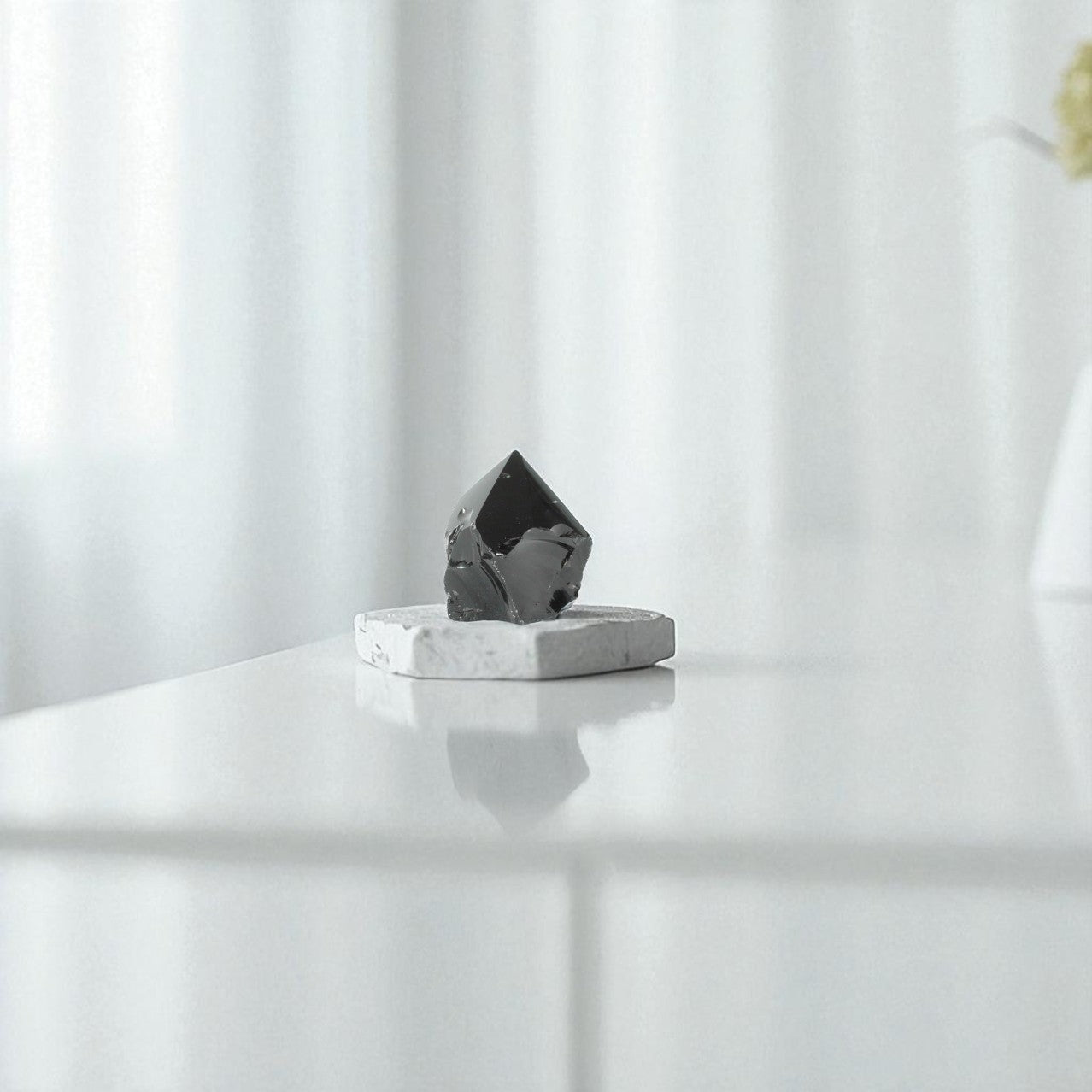 Black Obsidian Polished Point Crystal. Get the protection you need. Free express shipping. Shop online from ASH&STONE crystal shop Auckland NZ. AfterPay available.
