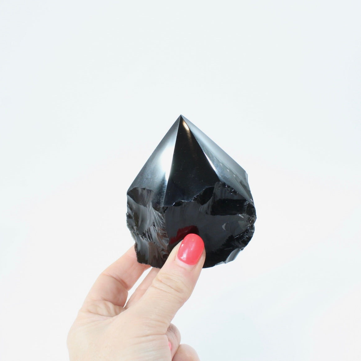 Black Obsidian Polished Point Crystal. Get the protection you need. Free express shipping. Shop online from ASH&STONE crystal shop Auckland NZ. AfterPay available.