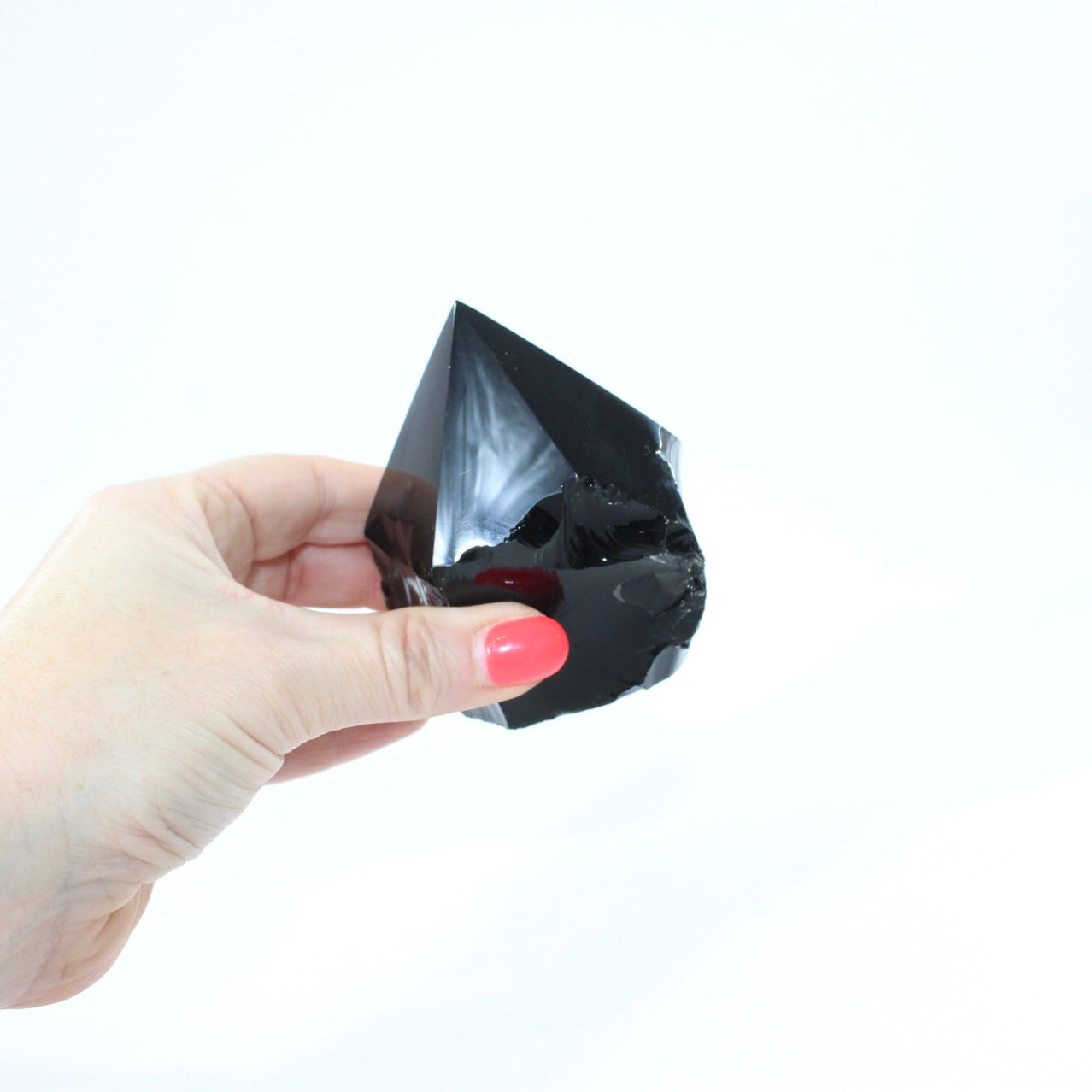 Black Obsidian Polished Point Crystal. Get the protection you need. Free express shipping. Shop online from ASH&STONE crystal shop Auckland NZ. AfterPay available.