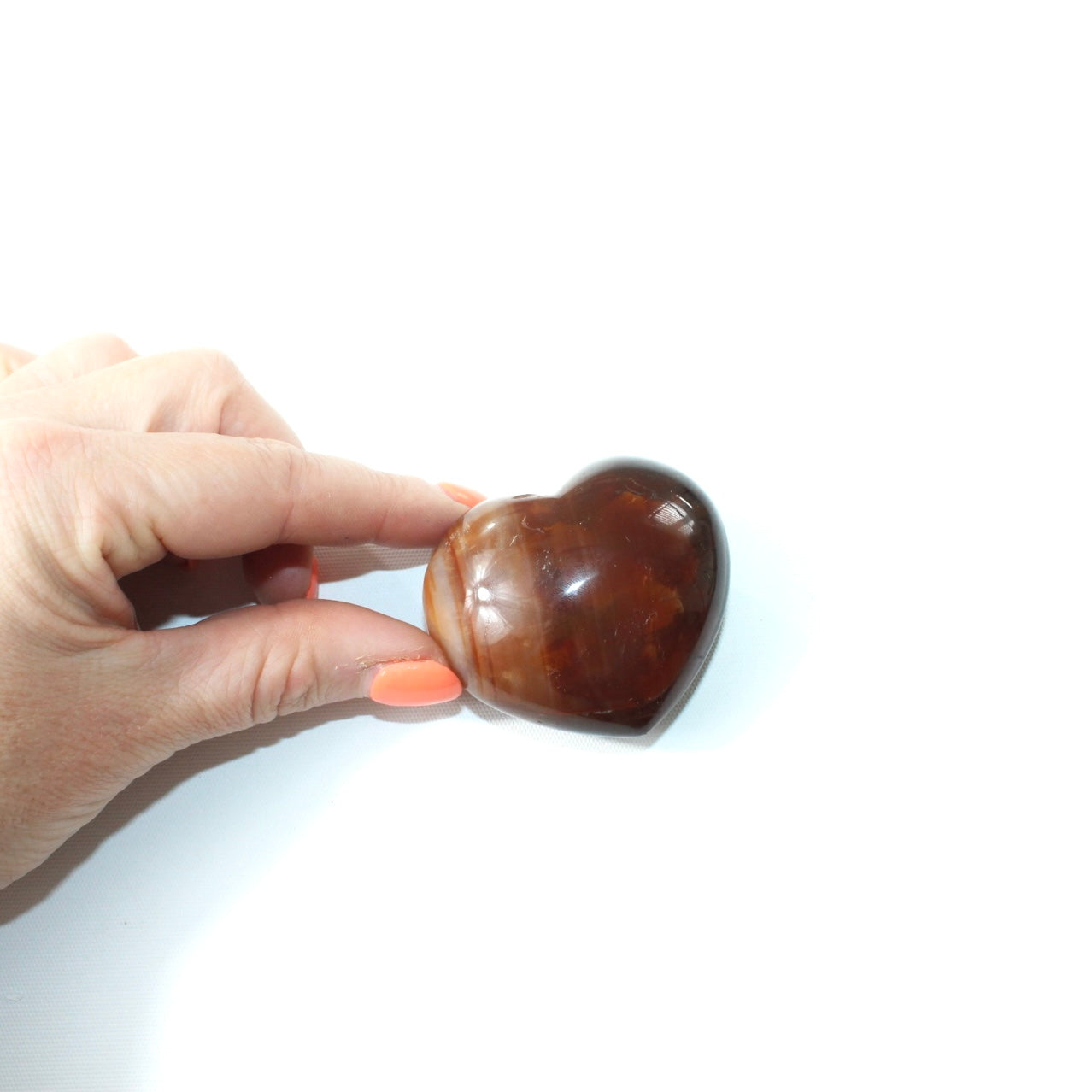 Carnelian deep red polished crystal heart. Free express shipping. Shop online from ASH&STONE crystal shop Auckland NZ. AfterPay available.