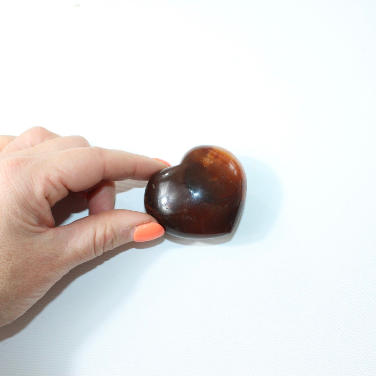 Carnelian deep red polished crystal heart. Free express shipping. Shop online from ASH&STONE crystal shop Auckland NZ. AfterPay available.