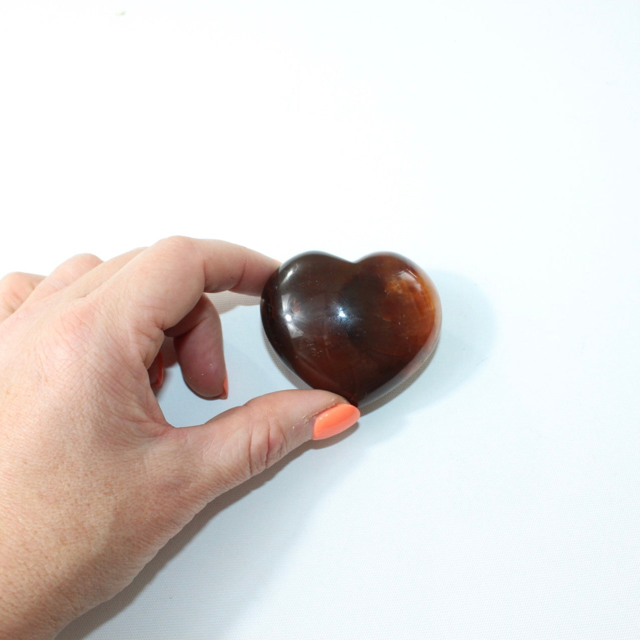 Carnelian deep red polished crystal heart. Free express shipping. Shop online from ASH&STONE crystal shop Auckland NZ. AfterPay available.