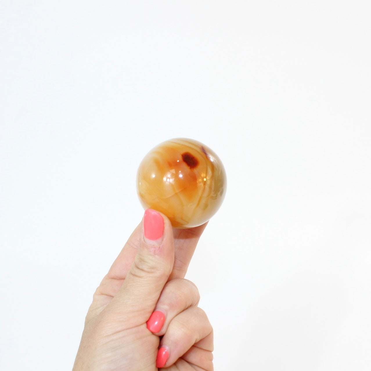 Carnelian Polished Crystal Sphere on stand | ASH&STONE, premium crystals Free express shipping in NZ 