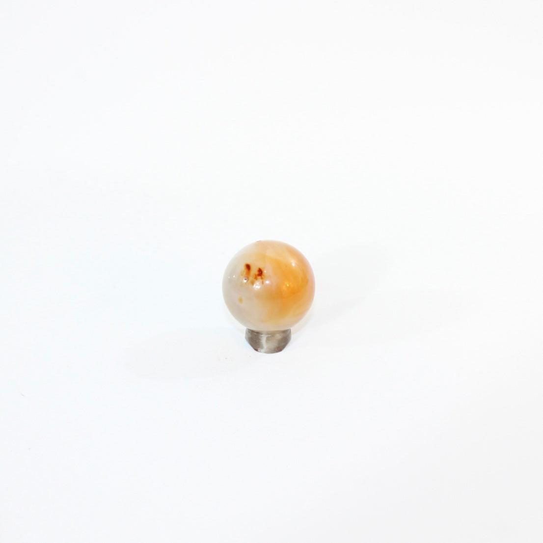 Carnelian Polished Crystal Sphere on stand | ASH&STONE, premium crystals online. Free express shippingin NZ 