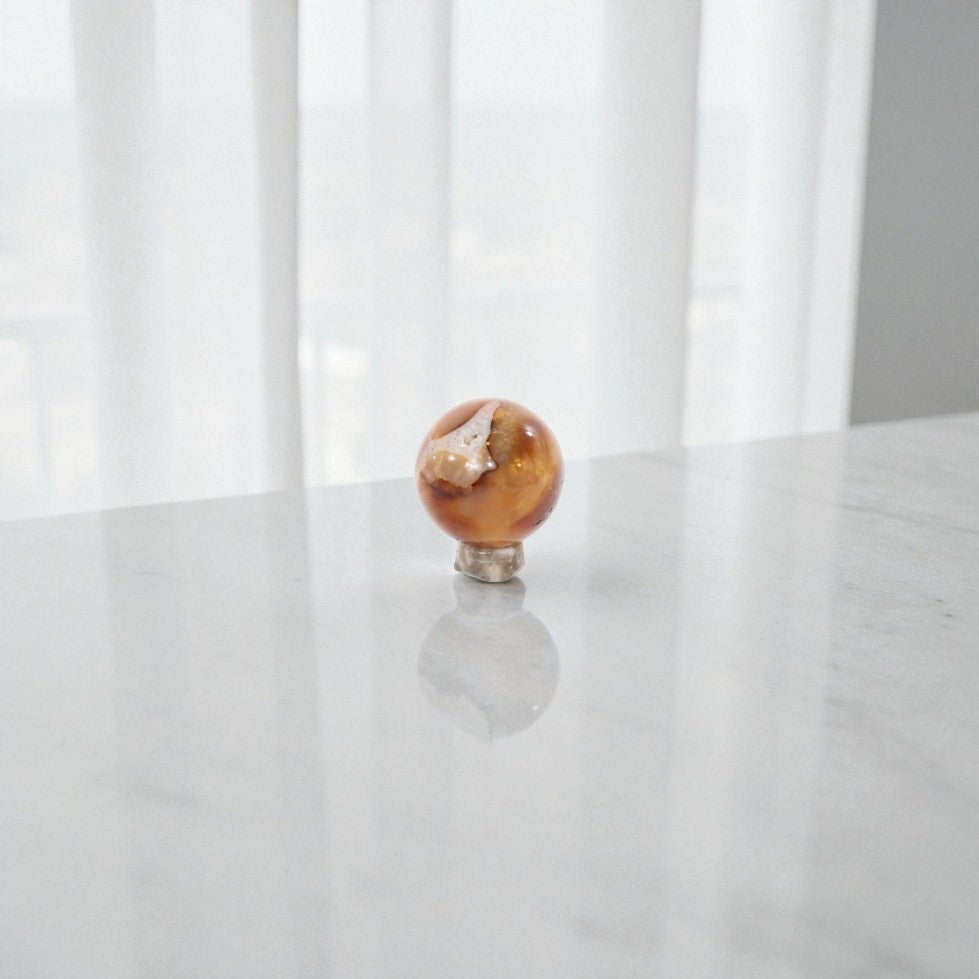 Carnelian Polished Sphere | ASH & STONE, Premium crystals online. Free express shipping. 