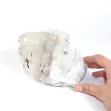 Load image into Gallery viewer, Large clear quartz crystal cluster with brookite 1.73kg Brookite is said to be a stone of Angelic connection and other innate spiritual abilities. This stone is also said to be helpful for those who want to enhance their spiritual growth.
