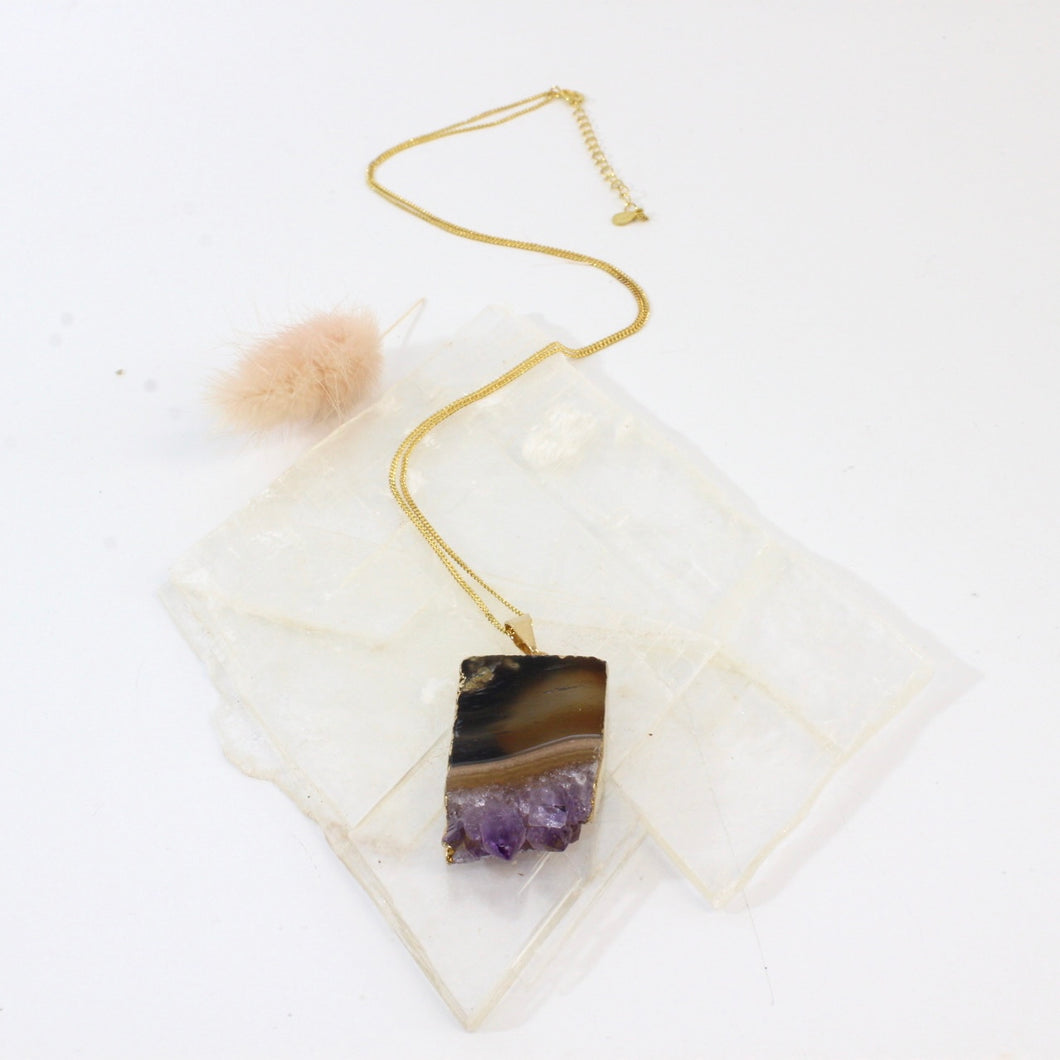 Amethyst crystal pendant with 20