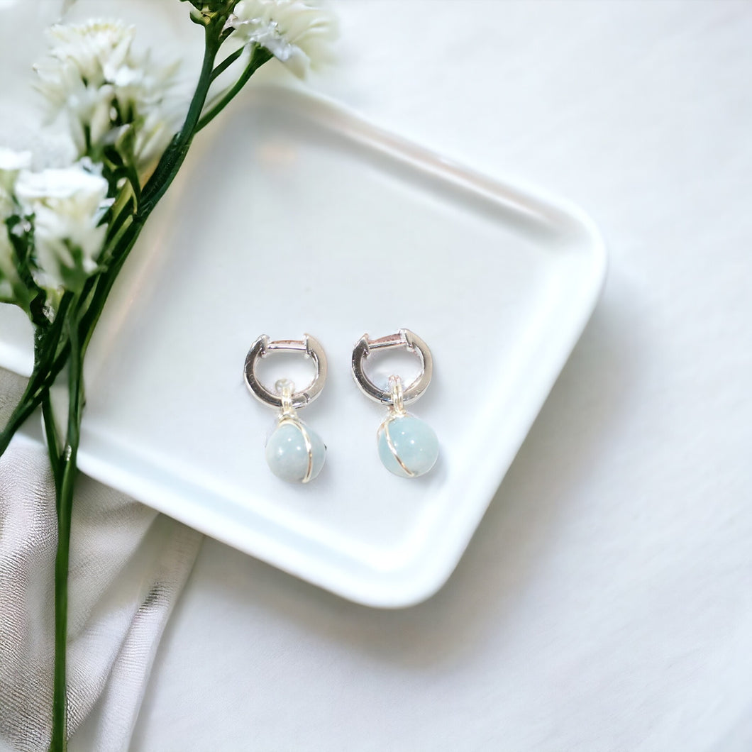 NZ-made aquamarine crystal huggie earrings: small, suits double piercing | ASH&STONE Crystal Jewellery Shop Auckland NZ