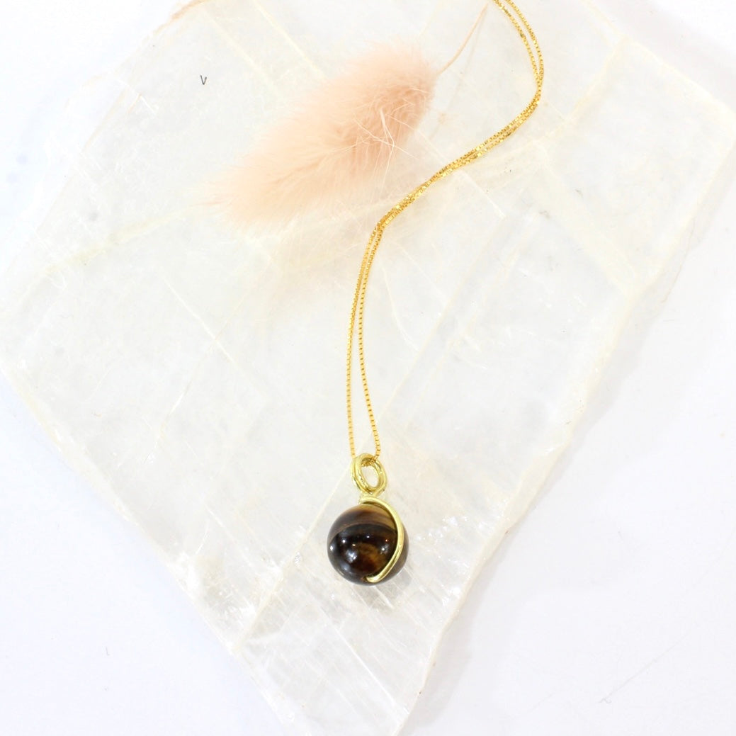 NZ-made tigers eye crystal pendant with 16