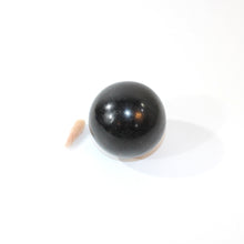 Load image into Gallery viewer, Black tourmaline polished crystal sphere | ASH&amp;STONE Crystals Shop Auckland NZ
