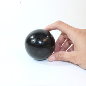 Black tourmaline polished crystal sphere | ASH&STONE Crystals Shop Auckland NZ