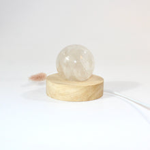 Load image into Gallery viewer, Clear quartz crystal sphere on LED lamp base | ASH&amp;STONE Crystals Shop Auckland NZ
