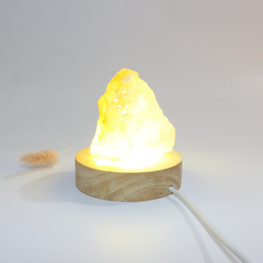 Golden healer crystal chunk on LED lamp base | ASH&STONE Crystals Shop Auckland NZ