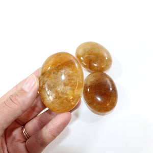 Golden healer polished crystal palm stone | ASH&STONE Crystal Shop Auckland NZ