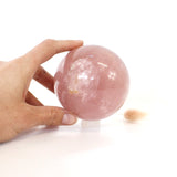 Rose quartz crystal polished sphere with clear quartz crystal stand 1.03kg | ASH&STONE Crystals Shop Auckland NZ