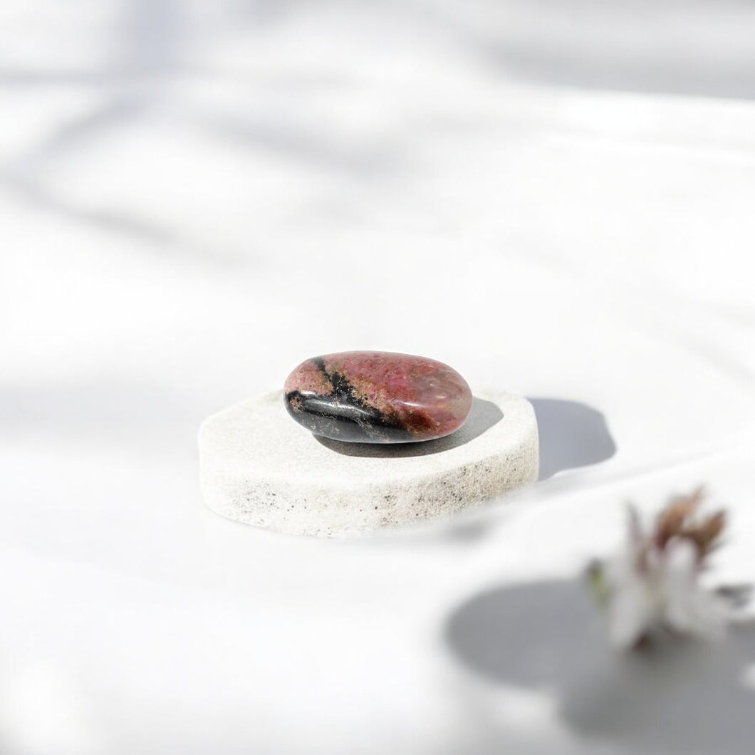 Rhodonite polished crystal palm stone | ASH&STONE Crystals Shop Auckland NZ