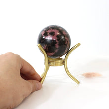 Load image into Gallery viewer, Rhodonite polished crystal sphere with stand | ASH&amp;STONE Crystals Shop Auckland NZ
