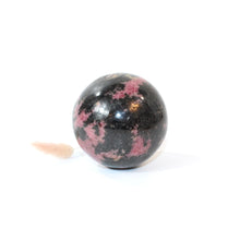 Load image into Gallery viewer, Rhodonite polished crystal sphere | ASH&amp;STONE Crystals Shop Auckland NZ
