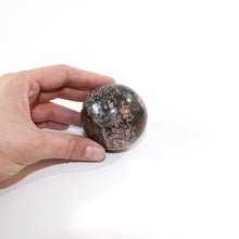 Load image into Gallery viewer, Rhodonite polished crystal sphere | ASH&amp;STONE Crystals Shop Auckland NZ
