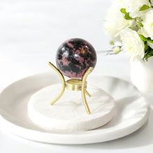 Load image into Gallery viewer, Rhodonite polished crystal sphere with stand | ASH&amp;STONE Crystals Shop Auckland NZ
