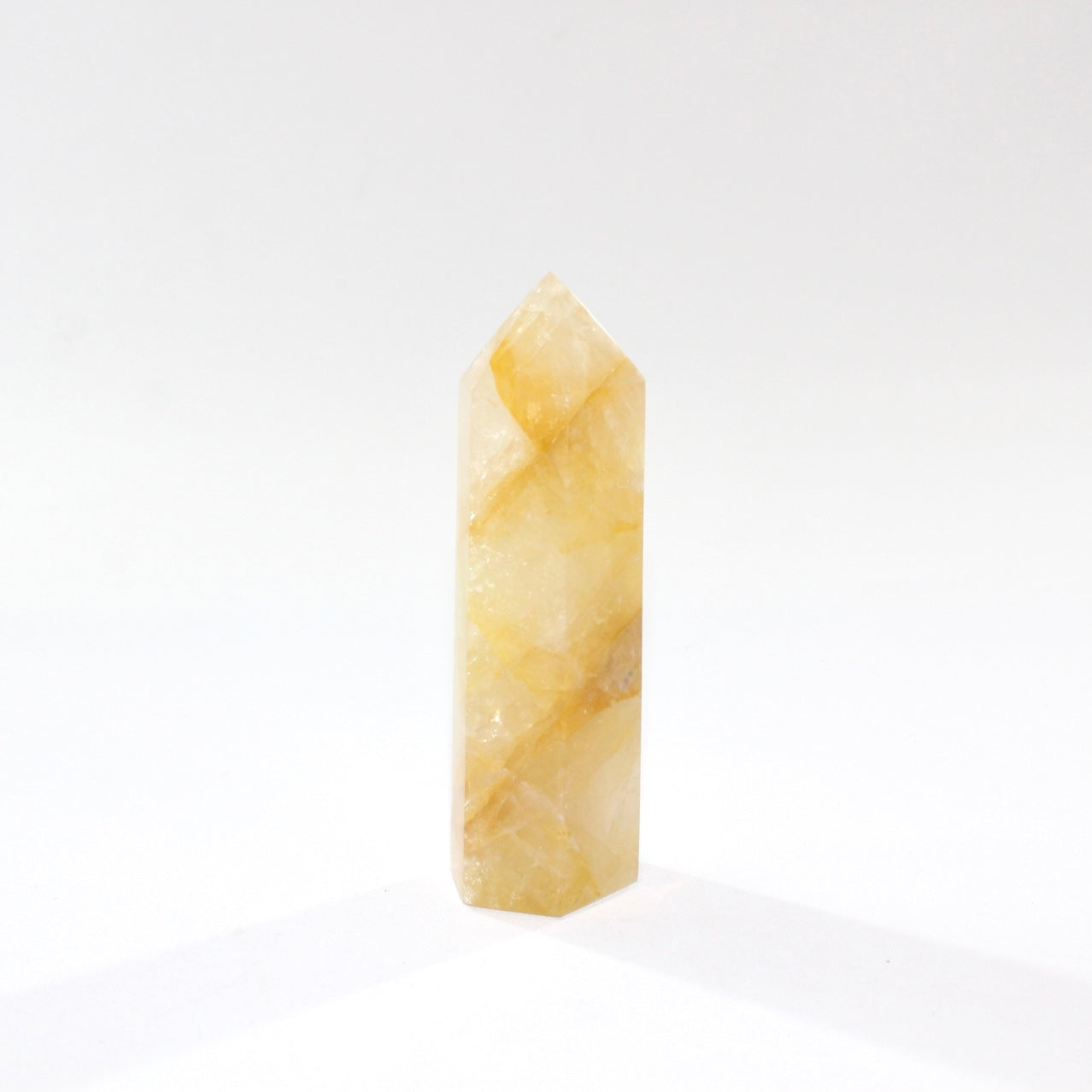 Golden Healer Crystal Tower. Free express shipping. Shop online from ASH&STONE crystal shop Auckland NZ. AfterPay available.