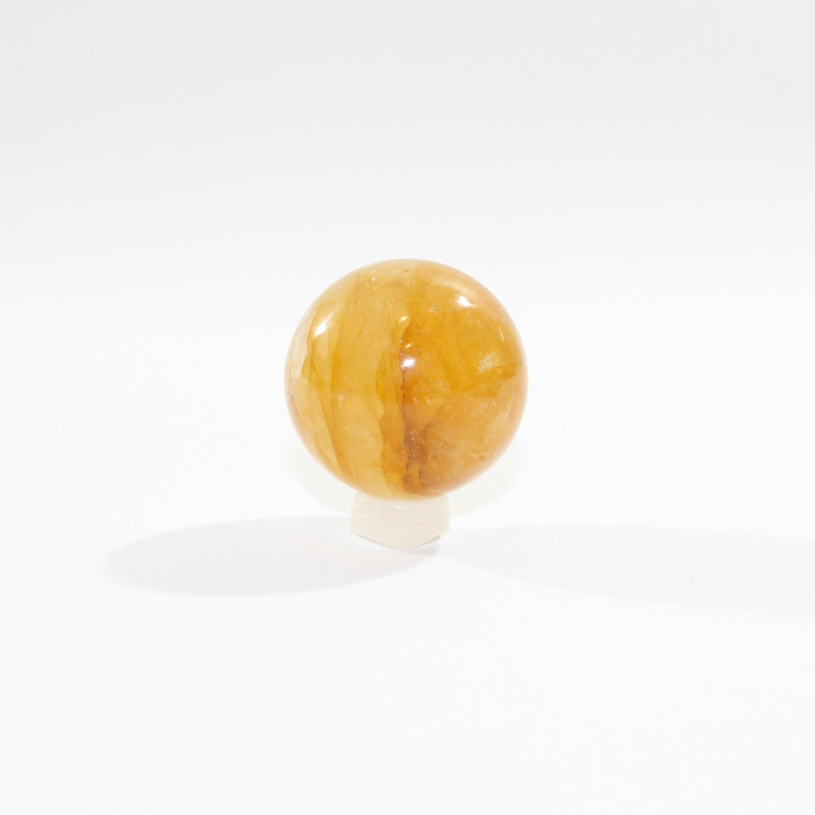 Golden Healer sphere crystal with stand 