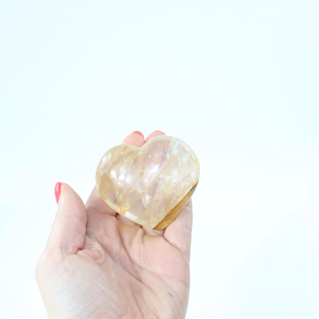 Golden Healer Crystal Heart in Quartz . Free express shipping. Shop online from ASH&STONE Crystal Shop Auckland NZ. AfterPay available. 
