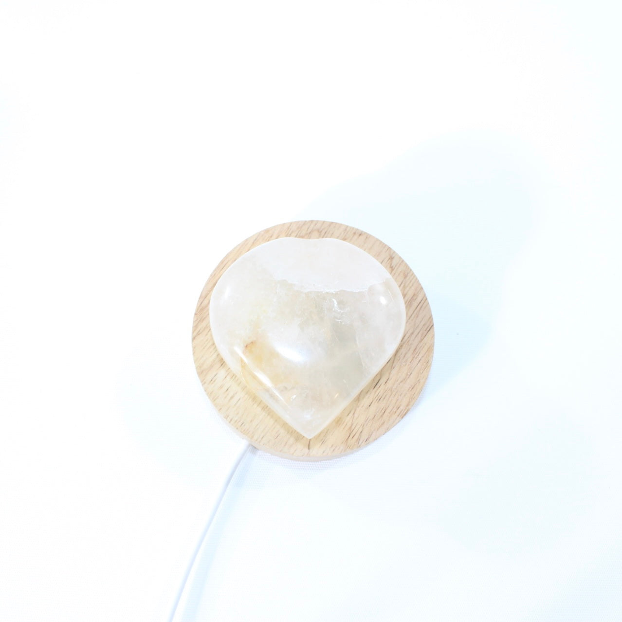 Golden healer in quartz heart crystal lamp. Free express shipping. Shop online from ASH&STONE crystal shop Auckland NZ. AfterPay available.
