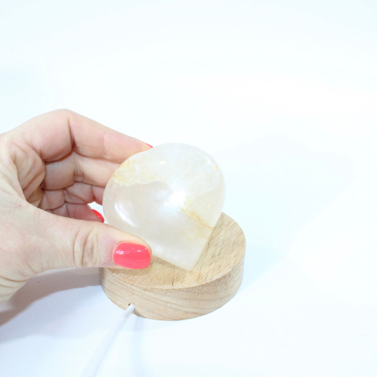 Golden healer in quartz heart crystal lamp. Free express shipping. Shop online from ASH&STONE crystal shop Auckland NZ. AfterPay available.
