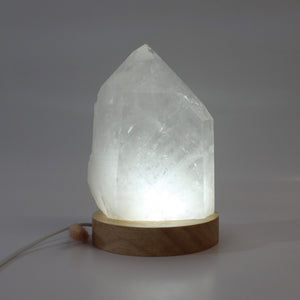 Large clear quartz crystal point on LED lamp base | ASH&STONE Crystals Shop Auckland NZ
