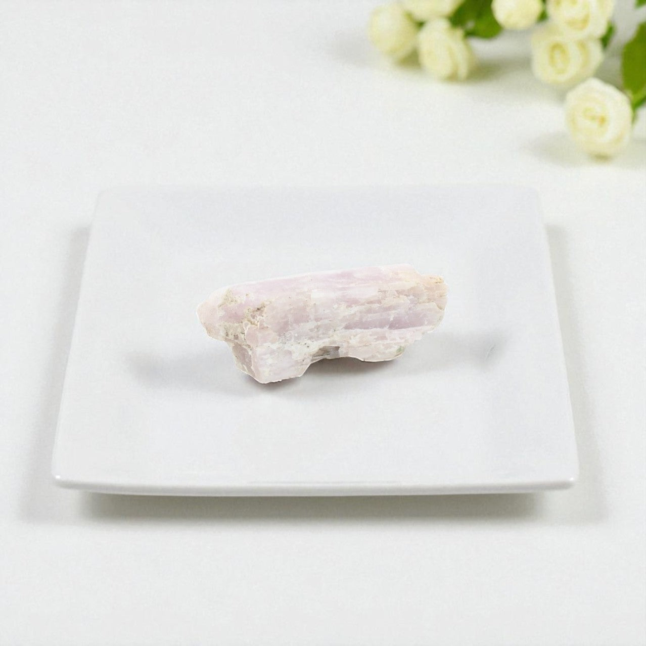 Natural Kunzite crystal chunk. Free express shipping NZ & Australia. Shop Kunzite crystals at ASH&STONE online or visit our Auckland crystal shop. AfterPay available.