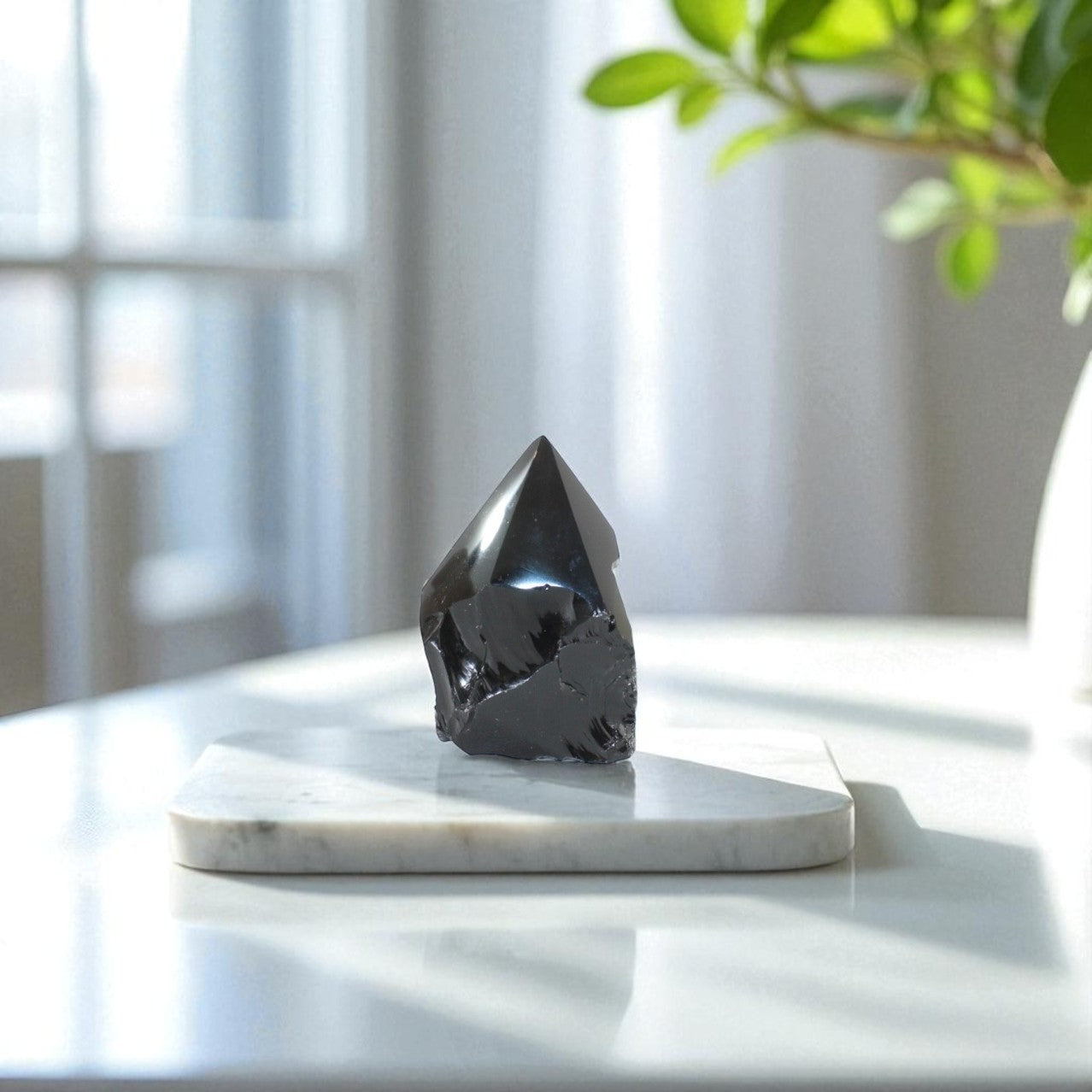 Black Obsidian Polished Point Crystal | ASH & STONE, Free express shipping Auckland NZ 