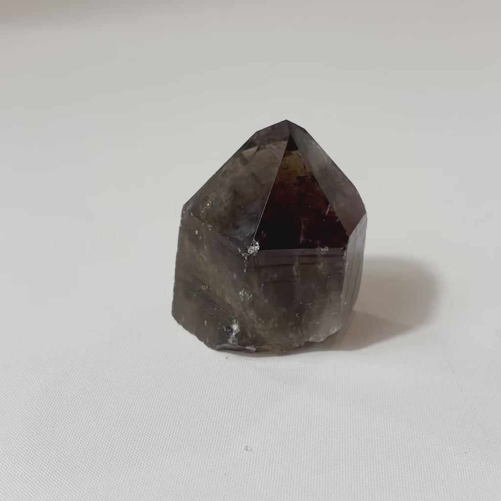 Smoky Quartz Polished Point Crystal | Free express shipping. Shop crystals online from ASH&STONE  crystal shop Auckland NZ. AfterPay available.