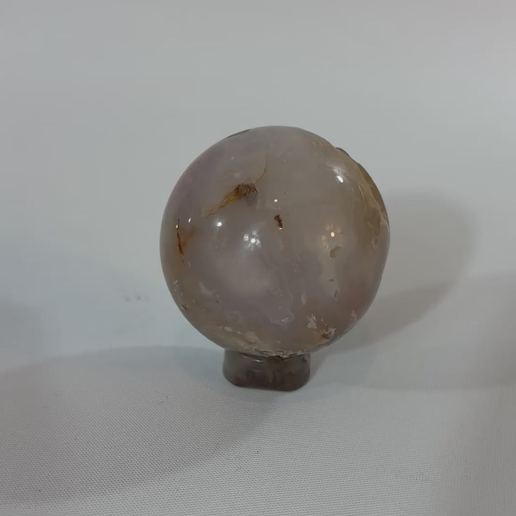 Plum Agate Polished Crystal Sphere on stand | ASH & STONE. Free express shipping.
