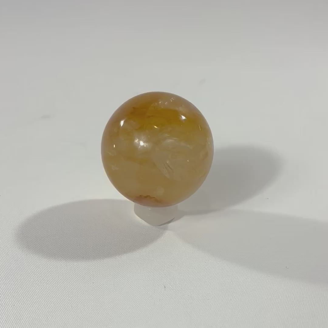 Golden Healer sphere crystal with stand 