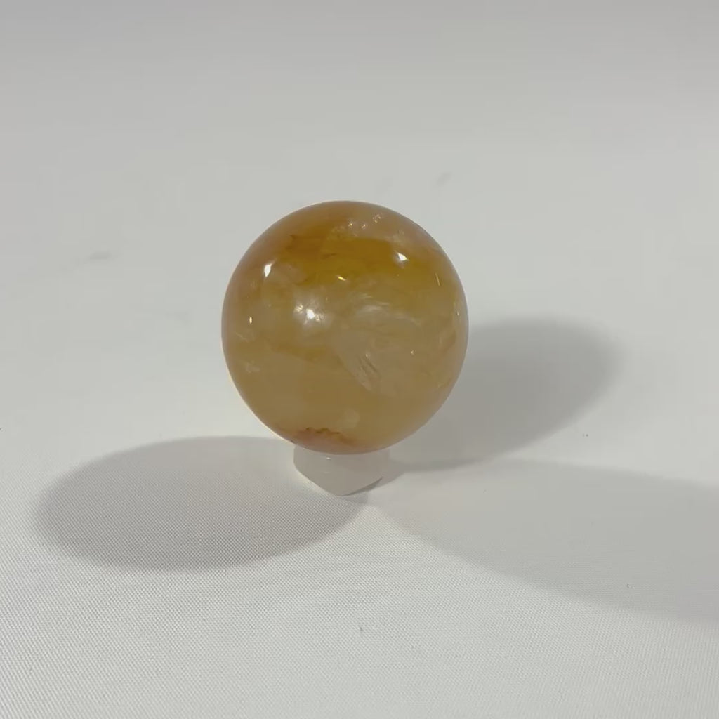 Golden Healer sphere crystal with stand 