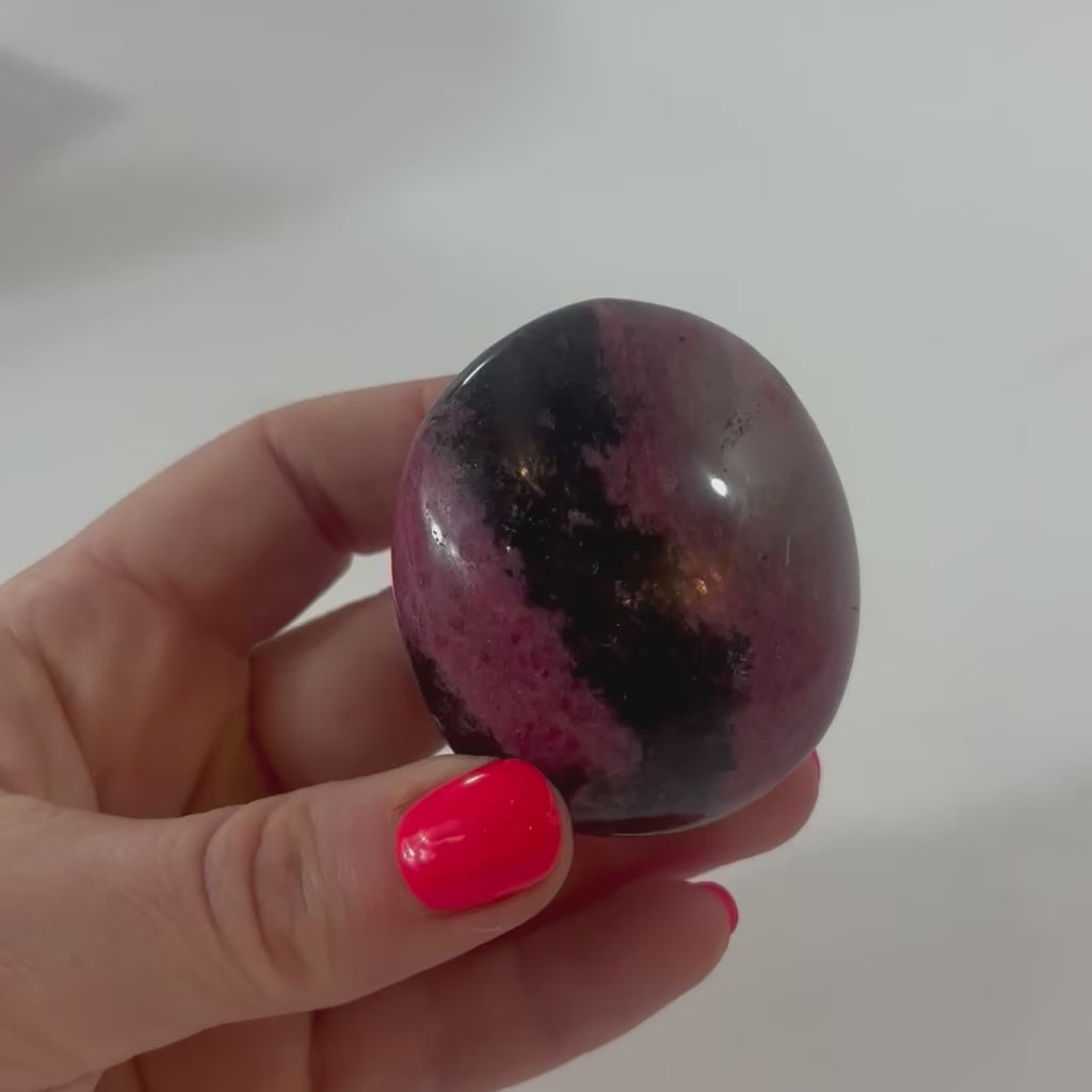 Rhodonite Palm stone | ASH & STONE. Crystals online, free express shipping, NZ.