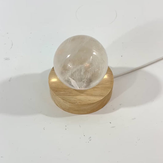 Clear quartz crystal sphere on LED lamp base | ASH&STONE Crystal Shop Auckland NZ