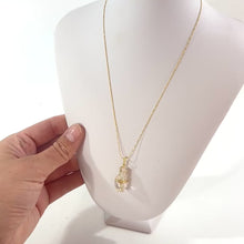 Load and play video in Gallery viewer, NZ-made clear quartz crystal pendant necklace | 24k gold-plated sterling silver chain
